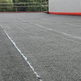 A flat roof that has been installed for a commercial client 